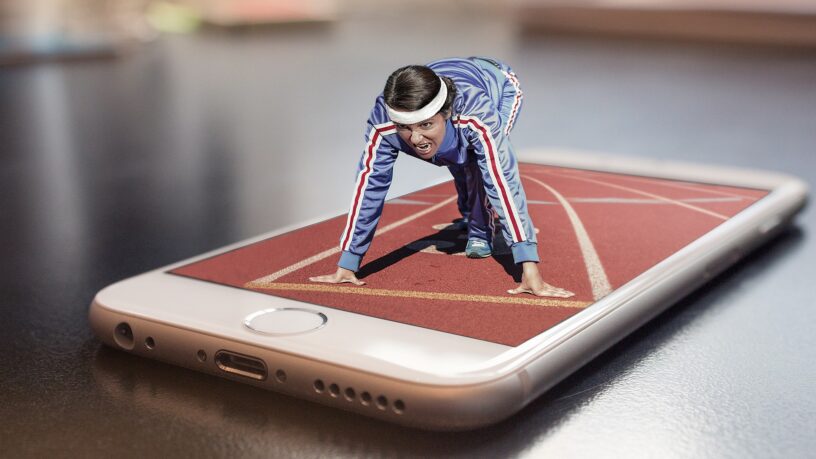 altered image of a woman getting ready to race on top of a cell phone